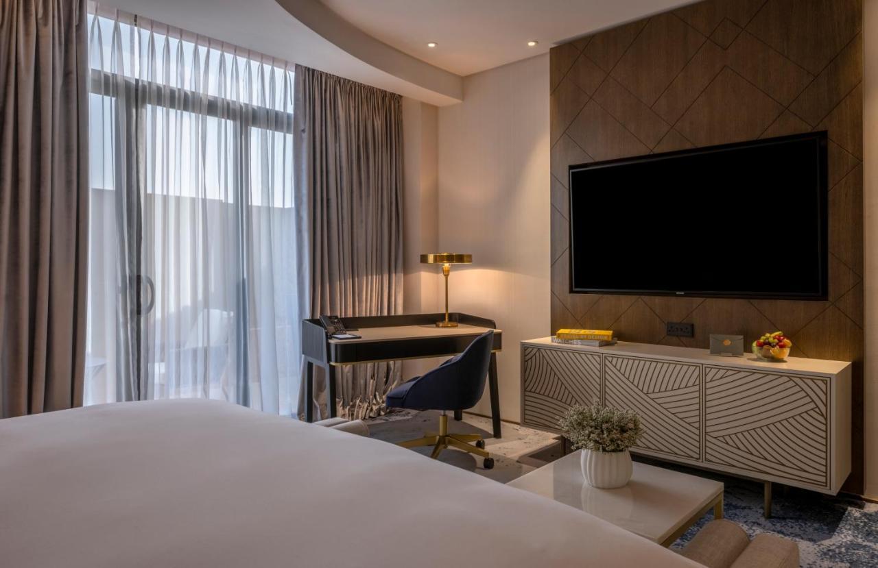 Jareed Hotel Riadh Exterior foto A bedroom at the hotel
