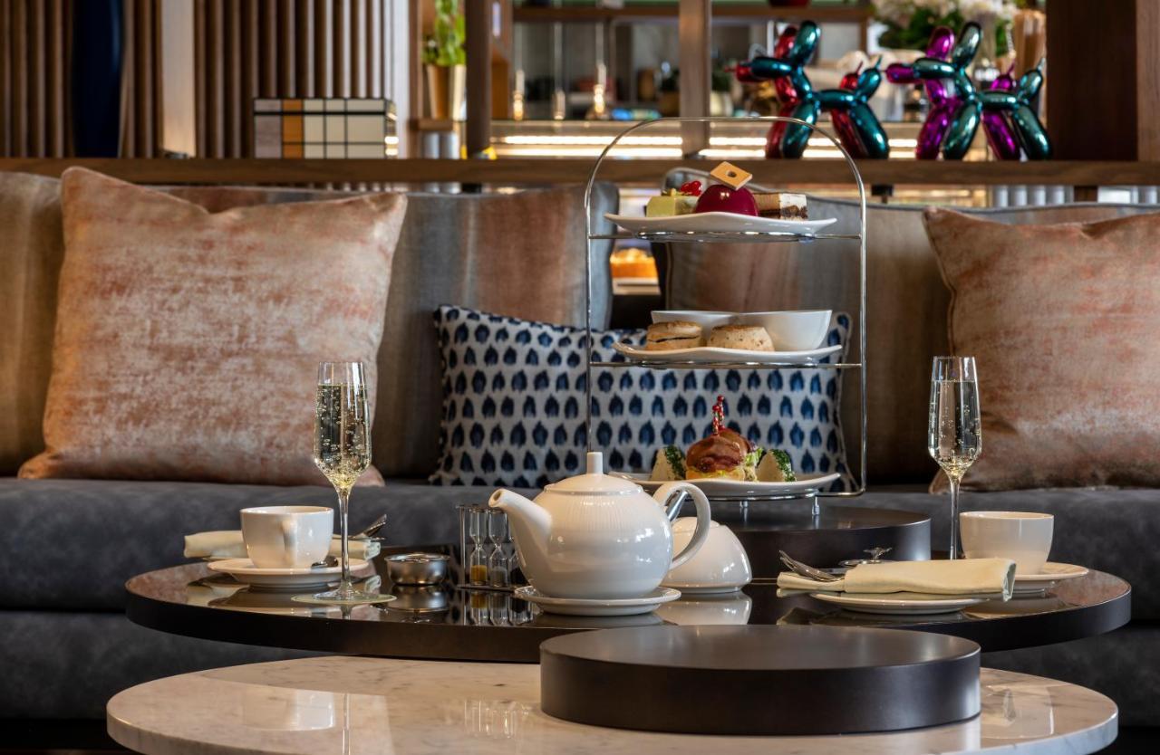 Jareed Hotel Riadh Exterior foto Afternoon tea at the hotel
